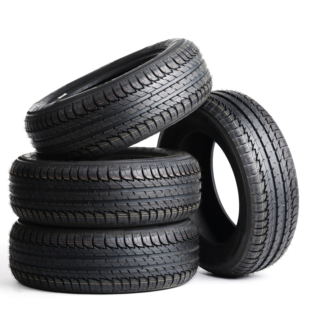 a pile of tires with a white background