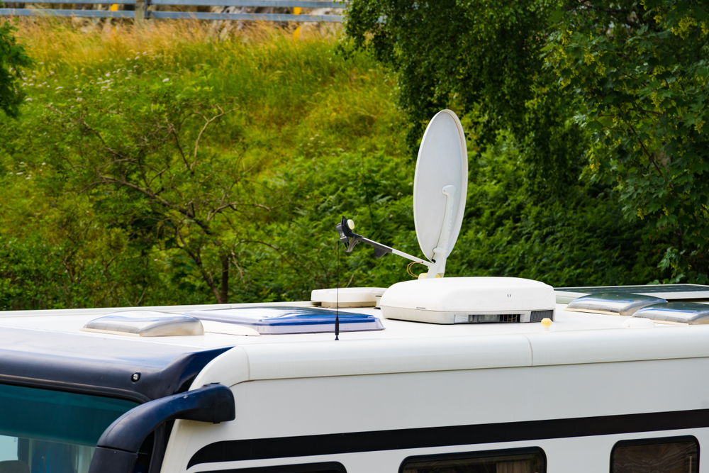 RV with an antenna attached to the roof