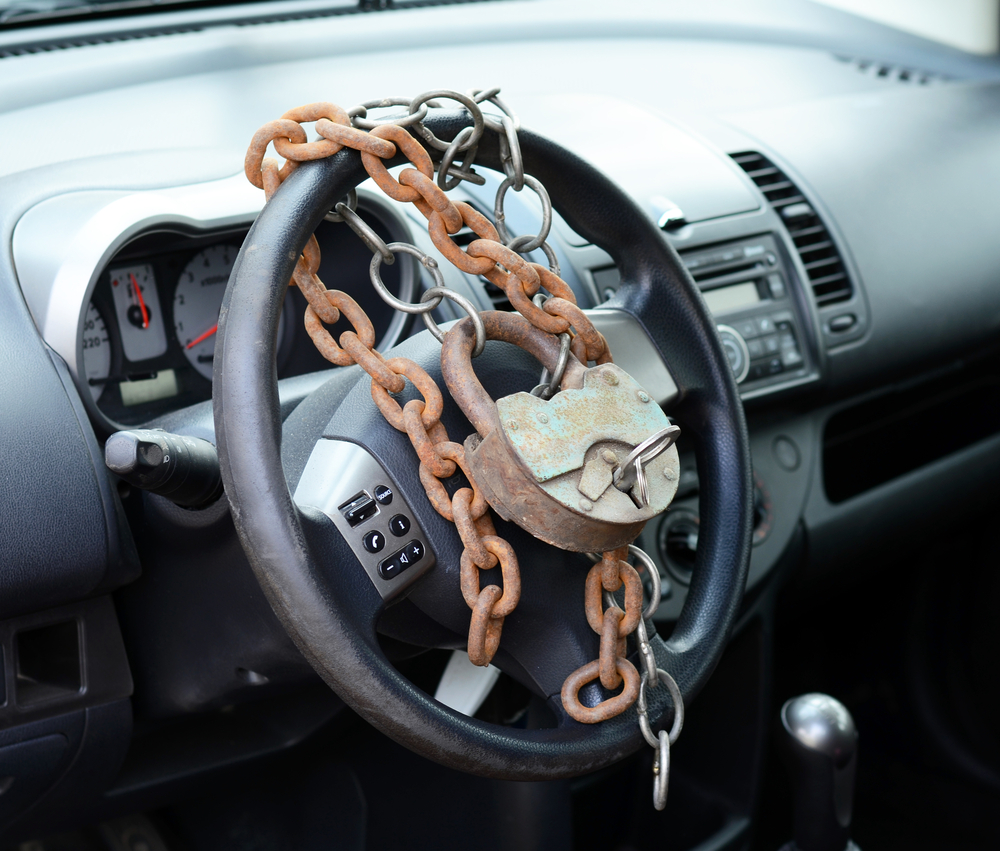 steering wheel covered with locks and chains