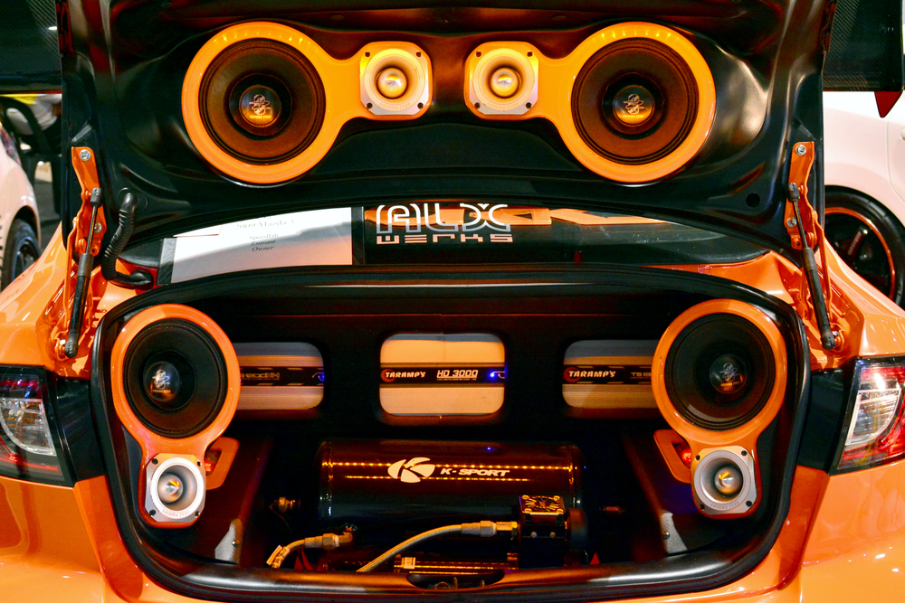 Custom car audio system with four subwoofers and multiple amplifiers