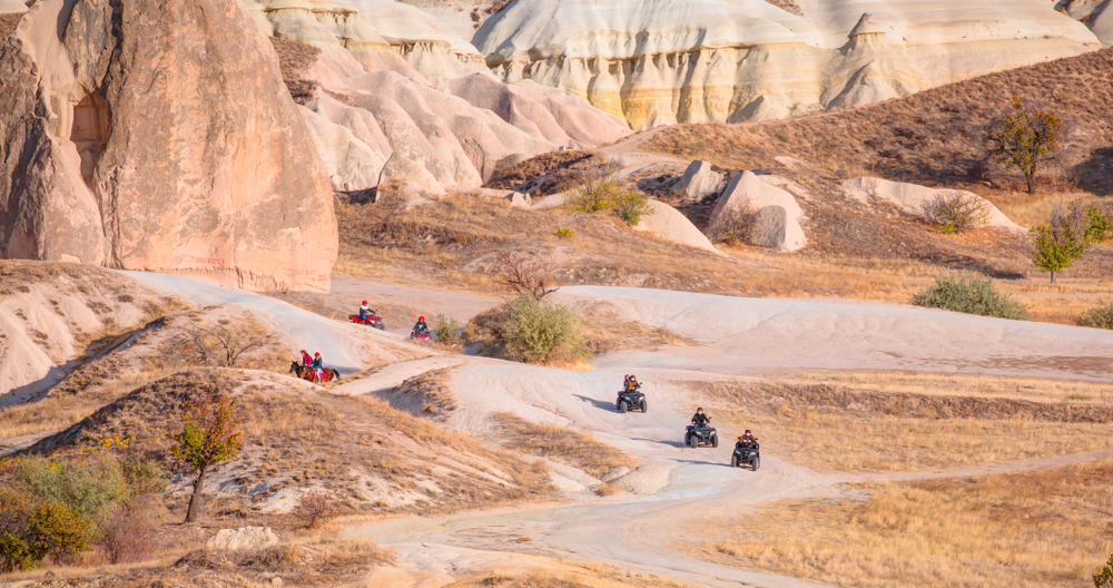 quads riding in the desert