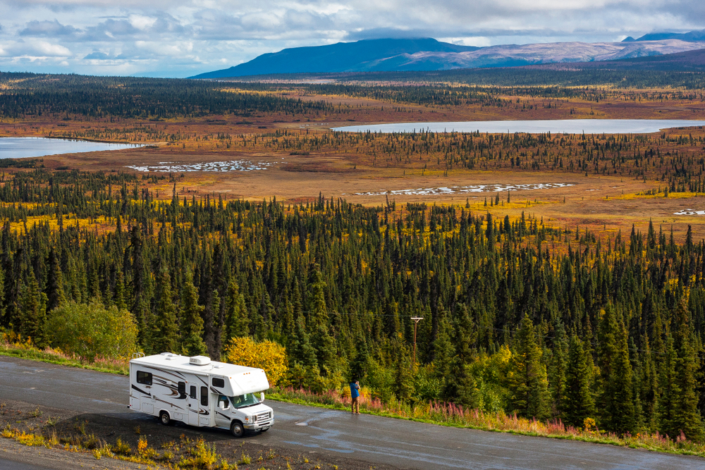 Fiberglass RV driving down the highway