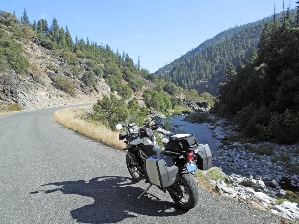 motorcycle on mountain road with panniers