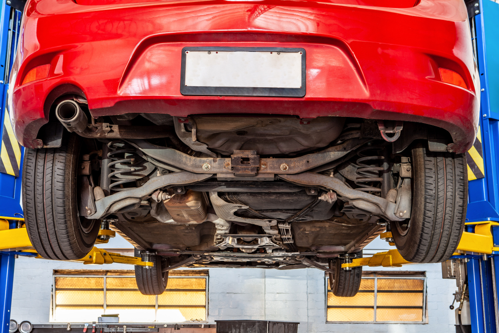 car on hydraulic lift