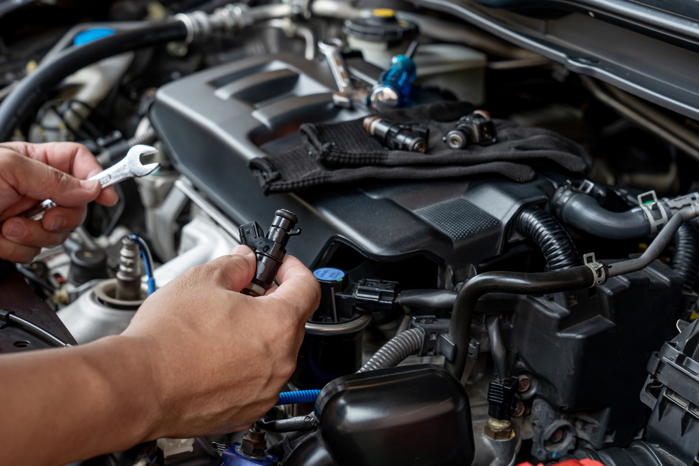 inspecting a fuel injector from a motor