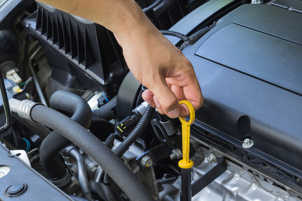 yellow dipstick in the engine bay