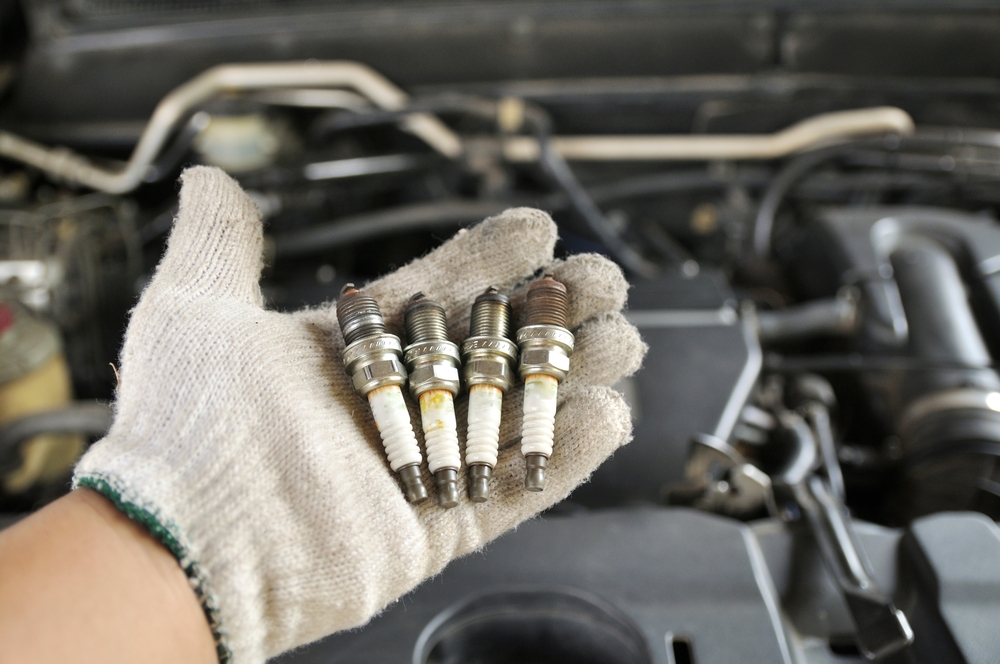 a handful of old and damaged plugs