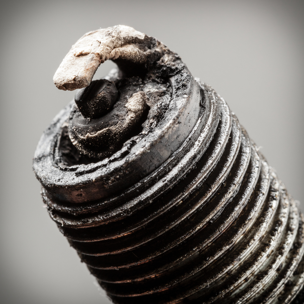 dirty and corroded spark plug