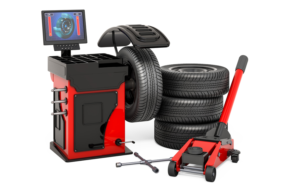 Tire balancing machine with 4 tires