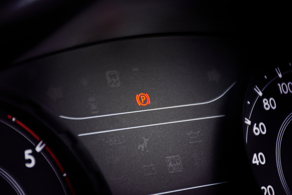 an emergency brake warning light on the dashboard