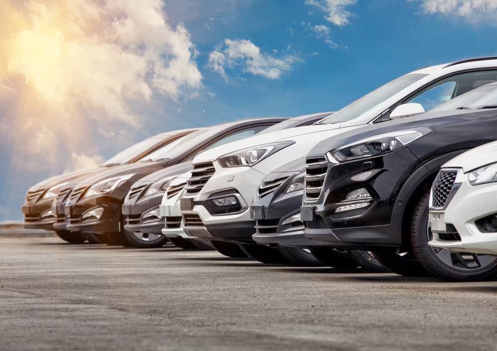 different vehicle models parked in a line