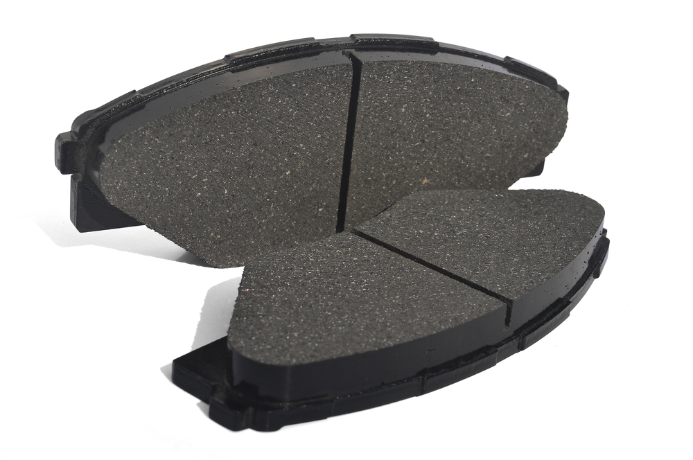 organic brake pads in white background