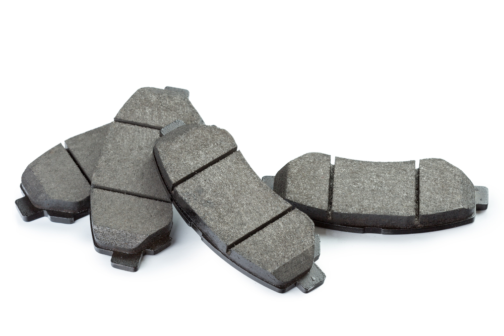 set of brake pads on white background